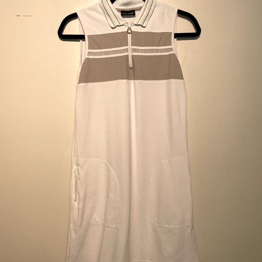 White golfino golf dress, gold details, pockets, breathable thick material.